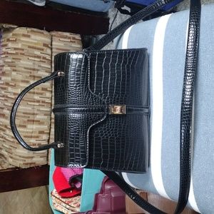 Black feux crocodile handbag